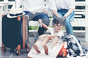 Happy family planning travel in summer vacation. Asia youngÂ people lifestyle packing bag luggage and enjoy